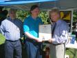 Danbury Mayor Mark Boughton presents CARA with a Proclamation. Harlan observes while Frank accepts the plaque.